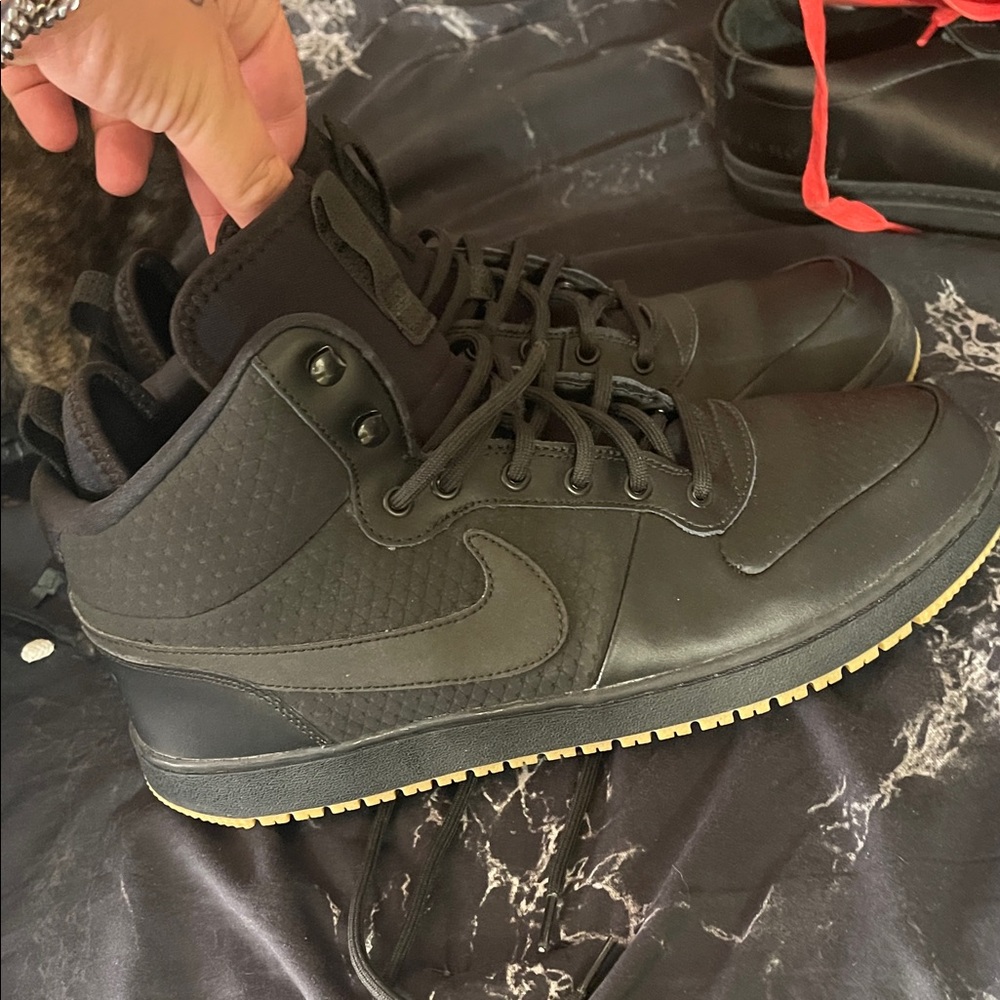 Nike Black High-Top Sneakers with Gold Accents